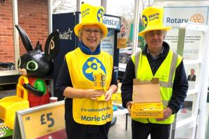 Two members at a past collection for Marie Curie.